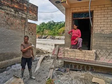 A month after Nepal floods, thousands are still missing and families face a long recovery