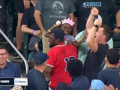 WATCH: Birthday girl shows off her arm after catching home run at Braves game