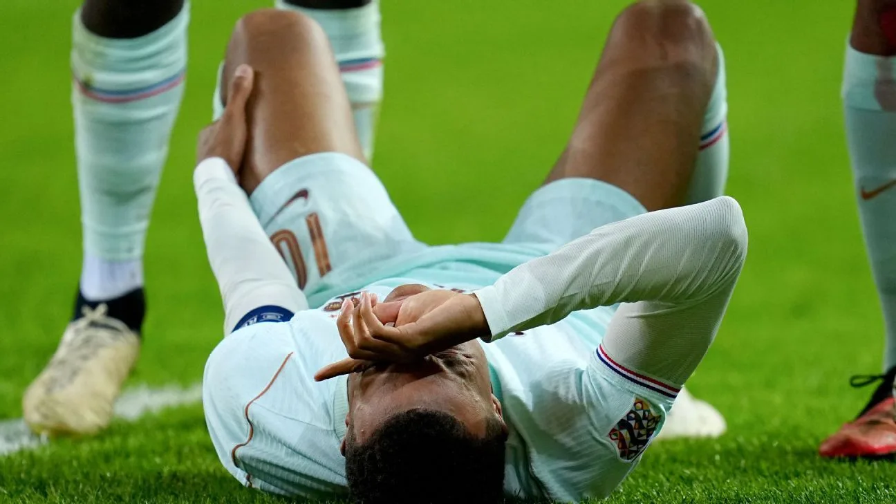 Mbappé to leave France camp after injury while scoring in Zidane's debut